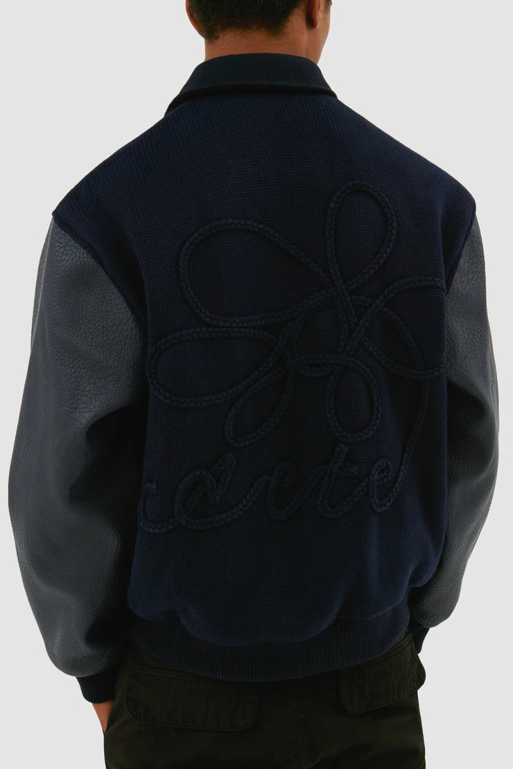 ARTE - EMBROIDERED FLOWER VARSITY